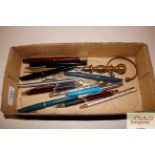 A collection of various vintage pens, letter opene