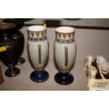 A pair of continental pottery baluster vases AF