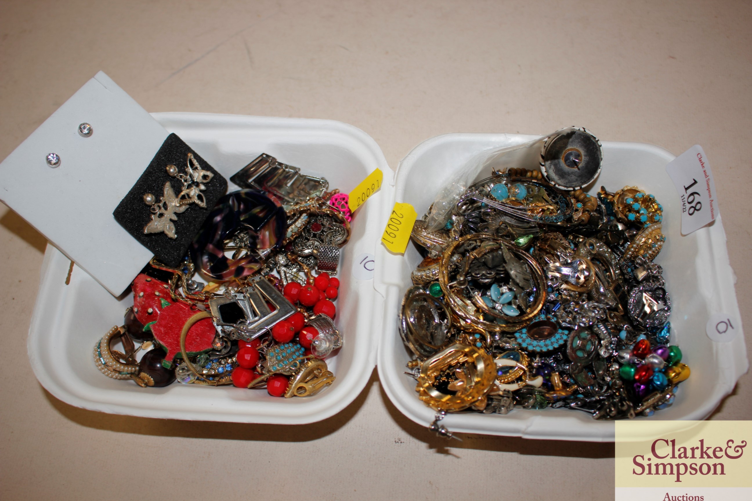 A tray box and contents of various pairs of ear-ri