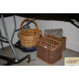 A wicker magazine rack and four baskets