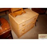 A wicker and cane three drawer chest