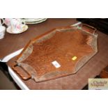 A copper Arts & Crafts design spot hammered tray