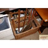 A wicker basket and contents of various metal ware