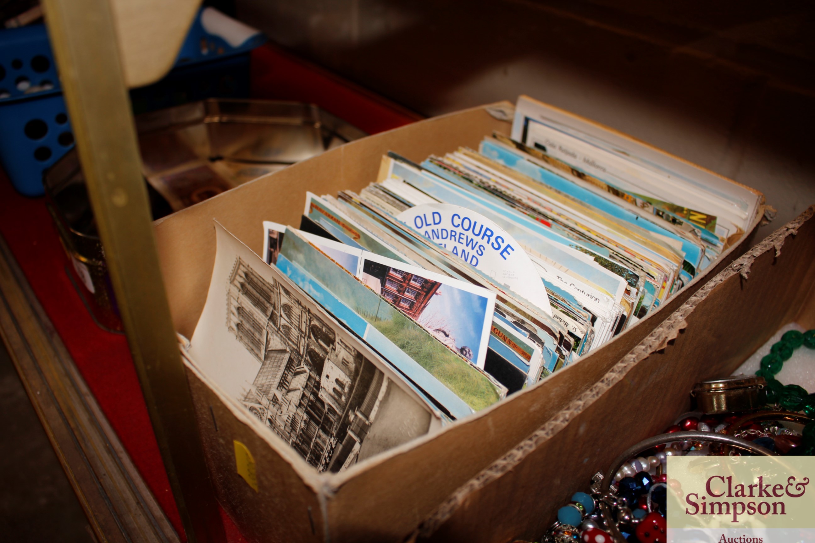 A box of mixed post-cards