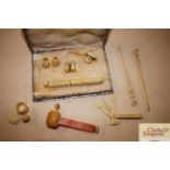 A collection of ivory and bone sewing items etc.