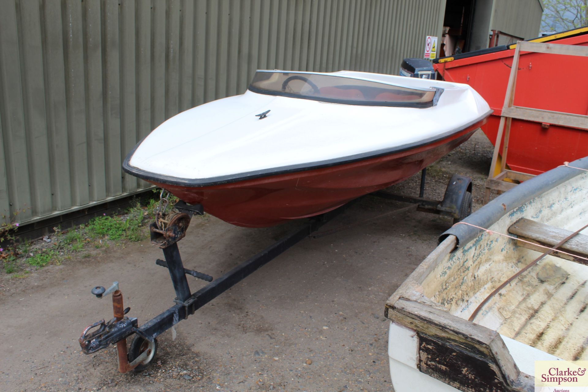 13ft speedboat. With Evinrude 60HP outboard (runs and pumps water), trailer, water skis, knee board,