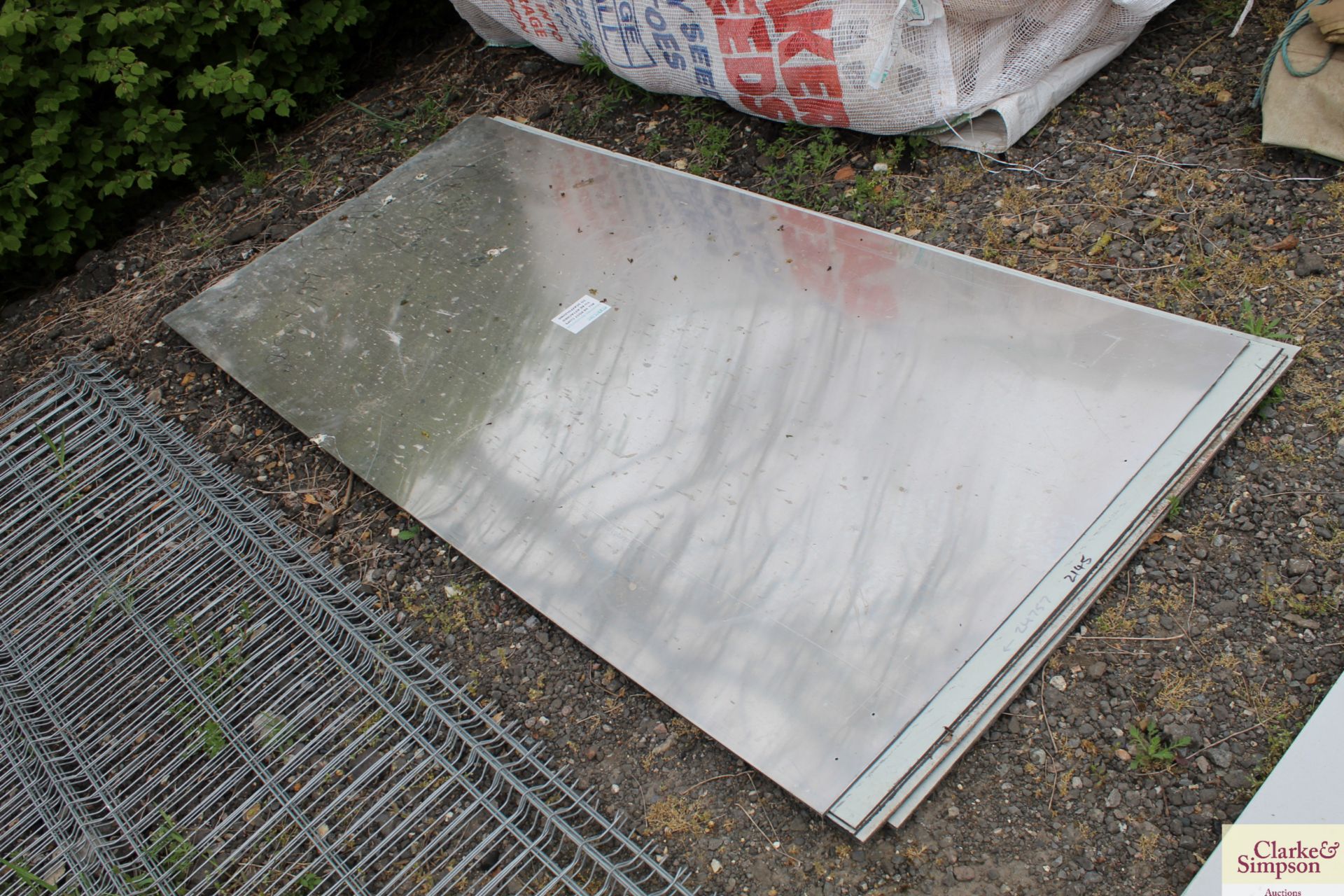 Diboard aluminium sandwiched plastic sheet.