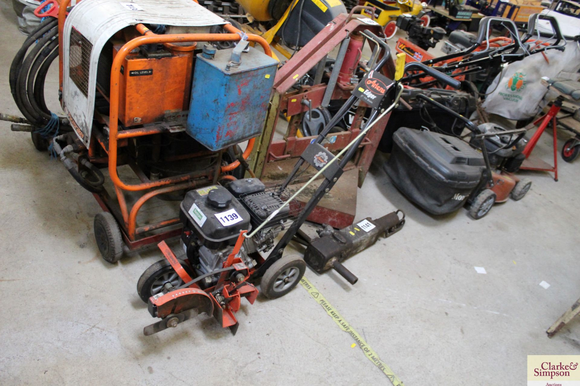 Ariens petrol lawn edger.