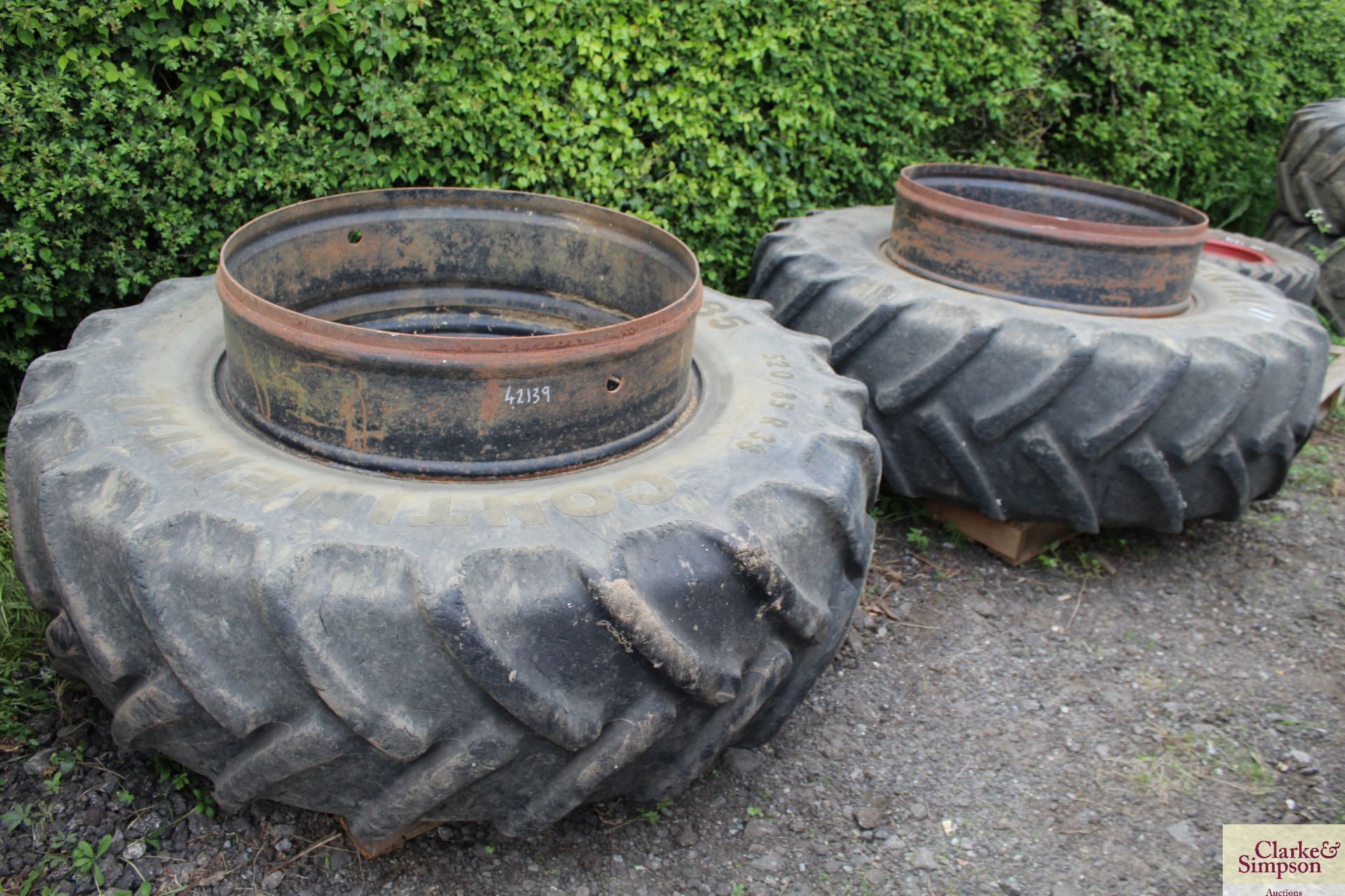 Pair of Stocks 520/85R38 dual wheels and clamps. V