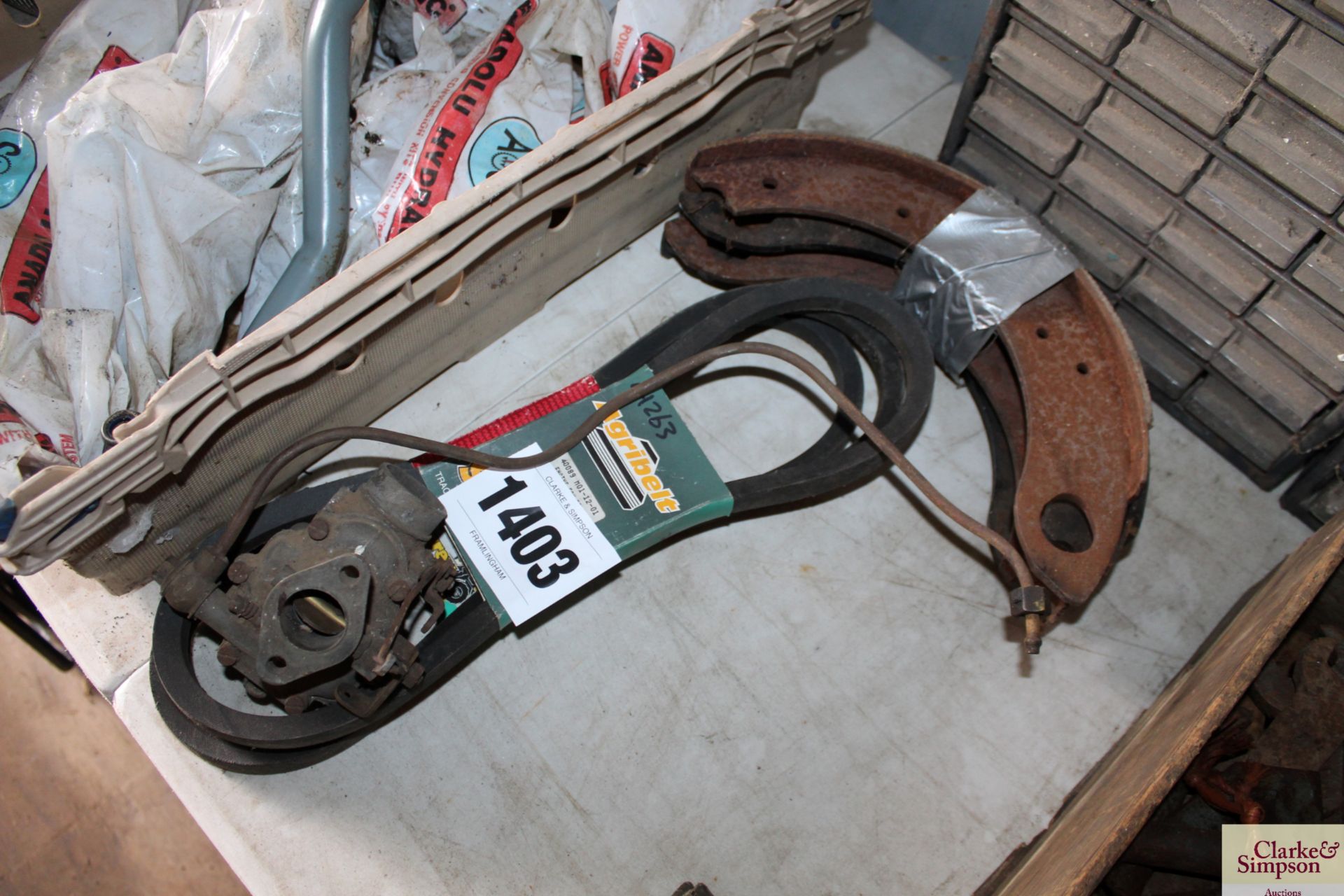 Unused Ferguson TE20 brake shoes, fan belts and FE35 carburettor.