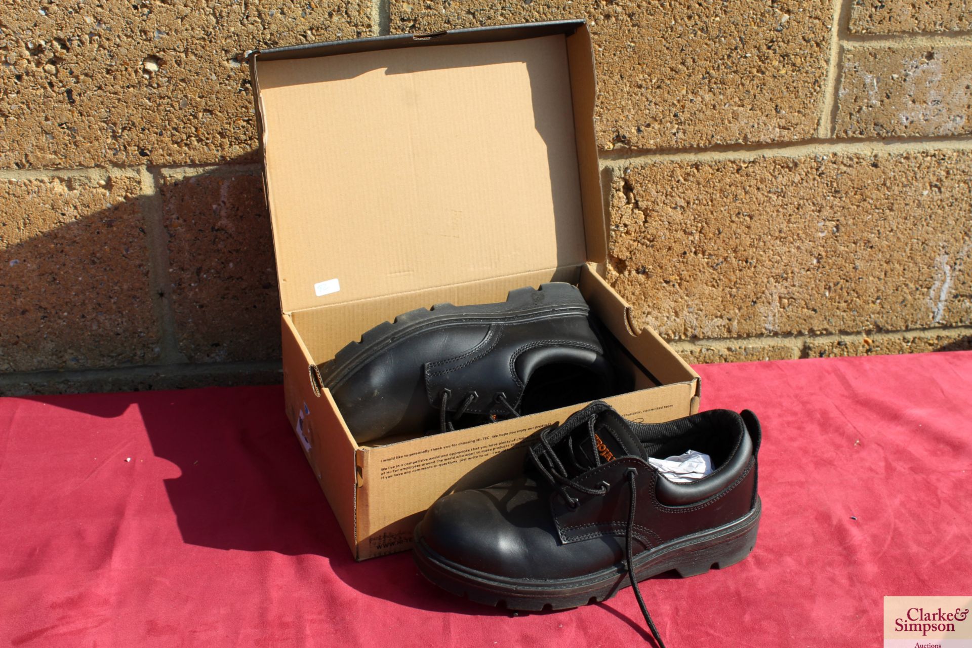 Pair unused size 8 steel toe cap shoes. V