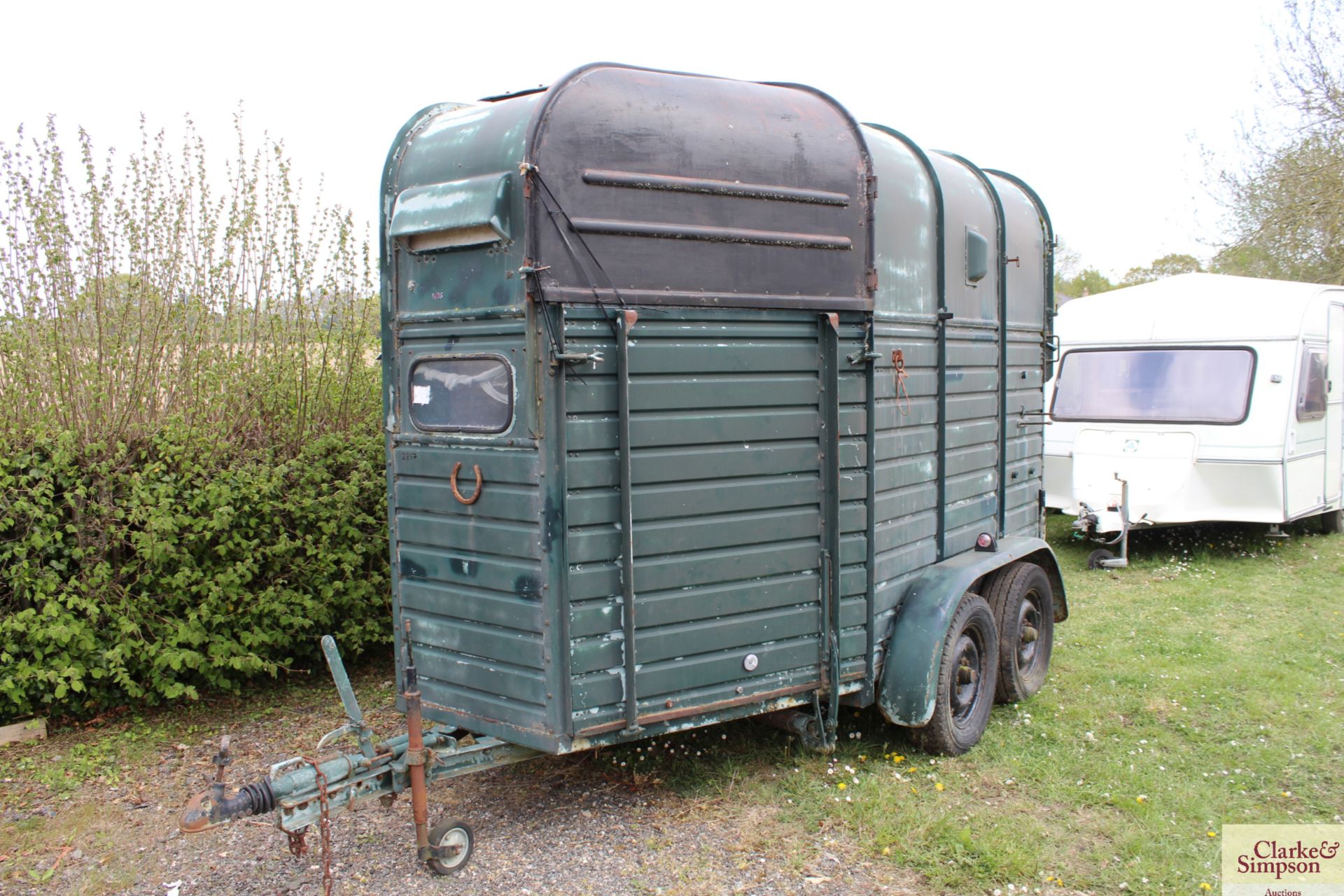 Rice two horse twin axle horse box. With front and rear ramps. Requires attention. V