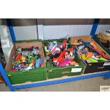 Three boxes containing various children's toys and