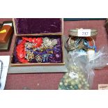 Two jewellery boxes and a bag of various costume j