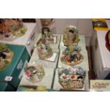 Six Lilliput Lane Secret Garden models with boxes