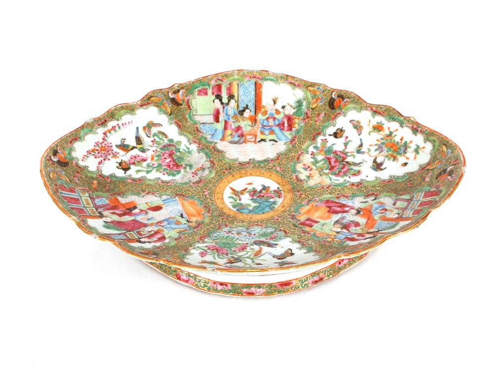 A 19th Century Canton oval comport, decorated in the traditional manner with figures in interiors,