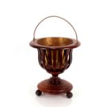 A mahogany and boxwood strung Dutch style bucket, with brass liner and swing handle, 39cm dia. x