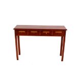 A mahogany side table, fitted four spice drawers and raised on square chamfered supports, 110cm,