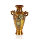 An Oriental brass and cloisonné baluster vase, floral decoration and beast handles, 28cm high