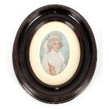A small watercolour miniature portrait, of a Georgian lady in oval ebonised frame