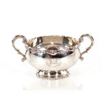 A George V silver twin handled baluster bowl, given as a Christening present with inscription to the