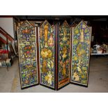 A four fold Victorian scrap work screen, in ebonised and gilt decorated frame, 184cm high