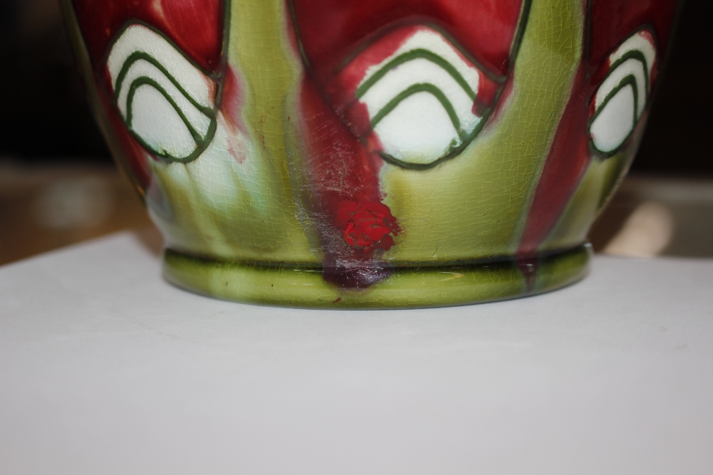 A Minton Secessionist pottery vase, with a red ground body and piped stylised flowers, printed - Image 3 of 4