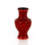 A Cinnabar lacquered baluster vase, 18cm high