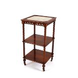 A Victorian rosewood three tier what not, with ratchet adjustable reading stand top, embroidered