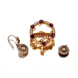 A yellow metal and amethyst and pearl set brooch,