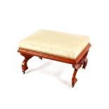 A Victorian mahogany dressing stool, having silk embroidered upholstery raised on a framed cushion