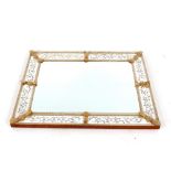 A Venetian glass wall mirror, having segment panels and etched foliate decoration, 100cm x 80cm