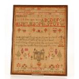 A 19th Century sampler, decorated verse, alphabet, numbers, house and flowers, worked by Janet