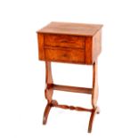 A 19th Century elm work table, fitted two short drawers and raised on lyre end supports united by an