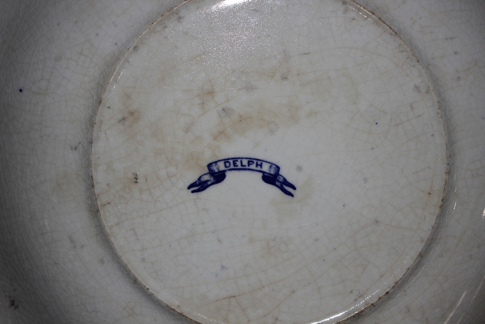 A 19th Century "Delph" blue and white plate, 24.5cm dia. - Image 2 of 2