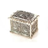 A Chinese silver plated jewellery casket, with a hinged lid, wavy edge and faux doors below, the