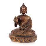 A large Oriental bronze figure, of a seated Buddha, 46cm high