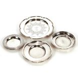 Three various circular silver small dishes. Total weight for the 3 dishes, approximately 166grams