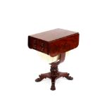 A Victorian mahogany sewing table, fitted with rounded drop leaves above two short drawers, silks