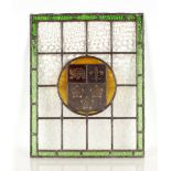 A 19th Century stained glass and leaded window panel, having central heraldic crest, 64cm x 51cm