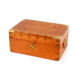 An Indian brass inlaid teak trinket box, having divisional lift out tray flanked by side carrying