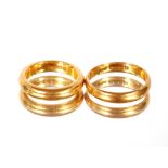 Two 22ct gold wedding bands, approx. 15gms