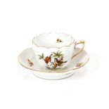 A Herend porcelain coffee cup and saucer in the Me