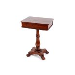 A Victorian mahogany sewing table, the single drawer fitted with a partitioned interior raised on