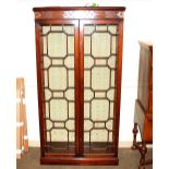 A good quality mahogany display cabinet, in the Chinese Chippendale manner, fitted interior glass