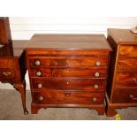 A Georgian mahogany cross banded and satin wood inlaid chest, fitted with a brushing slide and