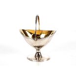 A George III Scottish silver swing handled bowl, with finely engraved exterior and gilded
