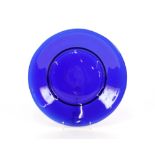 A Peking blue glass dish of plain form