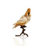 A Vienna style bronze figure of a parrot, seated on a branch, 29cm high