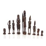A collection of nine various African carved hardwood male and female figures and busts, the